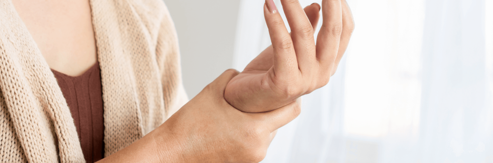 easing joint pain with tcm - hands held up as if rubbing due to soreness
